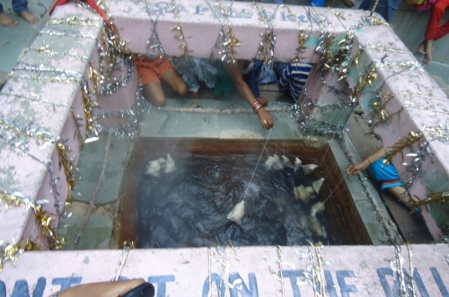 Hot water spring at a temple in Manikaran